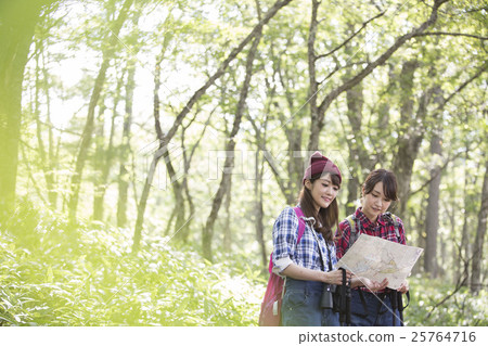 Woman trekking 25764716