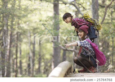 Woman trekking 25764768