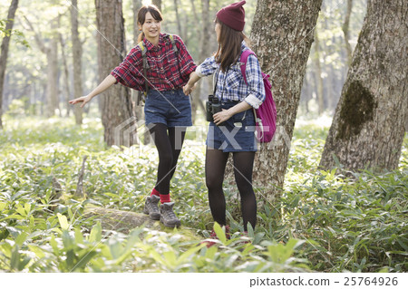 Woman trekking 25764926