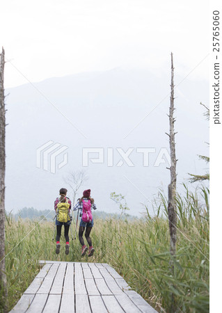 Woman trekking 25765060
