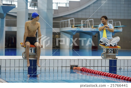 Swimmers and coaches 25766441