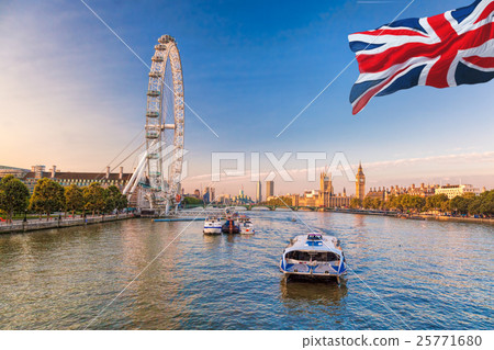 Sunrise with Big Ben and London Eye in London, UK 25771680