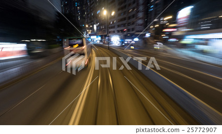 Traveling by tram in night Hong Kong 25772907