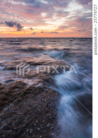 Long exposure sea and rocks at twilight Long exposure sea and rocks at twilight 25779727