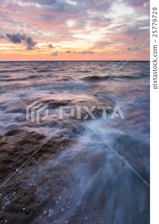 Long exposure sea and rocks at twilight Long exposure sea and rocks at twilight 25779729