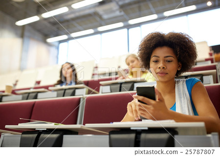 african student girl with smartphone at lecture african student girl with smartphone at lecture 25787807