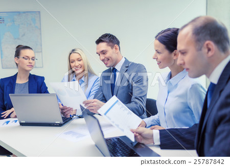 business team with laptop having discussion business team with laptop having discussion 25787842