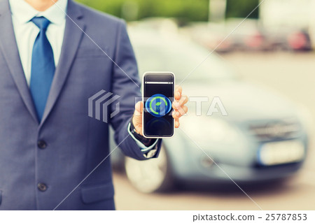 close up of business man with smartphone and car 25787853