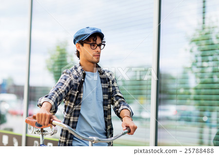 hipster man walking with fixed gear bike 25788488