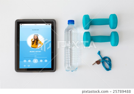 tablet pc, dumbbells, whistle and water bottle 25789488