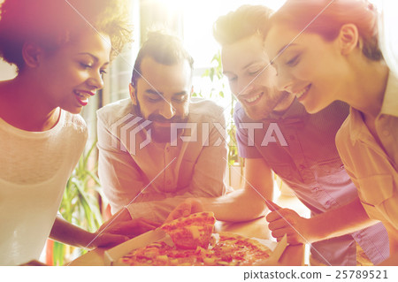 happy business team eating pizza in office happy business team eating pizza in office 25789521