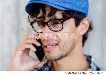 close up of man calling on smartphone close up of man calling on smartphone 25789614