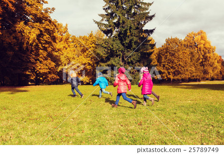 group of happy little kids running outdoors 25789749