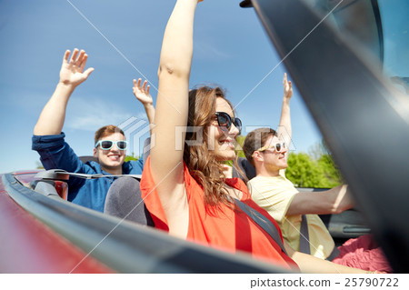 happy friends driving in cabriolet car at country happy friends driving in cabriolet car at country 25790722