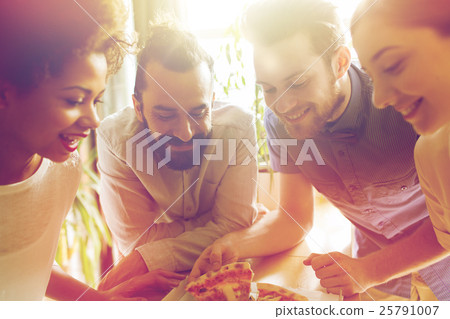 happy business team eating pizza in office happy business team eating pizza in office 25791007
