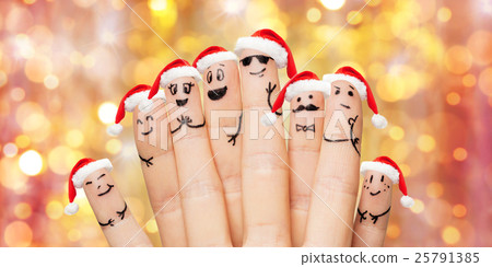 close up of hands and fingers with smiley faces 25791385