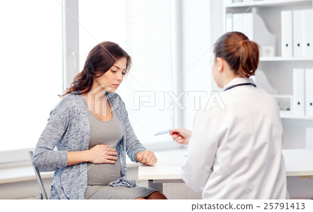 gynecologist doctor and pregnant woman at hospital 25791413