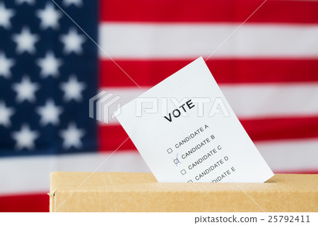 vote inserted into ballot box slot on election vote inserted into ballot box slot on election 25792411