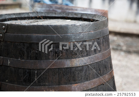 close up of old wooden barrel outdoors close up of old wooden barrel outdoors 25792553