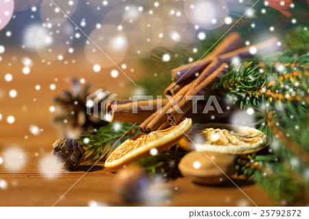 christmas fir branch, cinnamon and dried orange christmas fir branch, cinnamon and dried orange 25792872