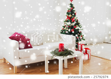 sofa, table and christmas tree with gifts at home sofa, table and christmas tree with gifts at home 25792874