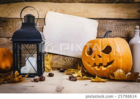 Halloween pumpkin with lantern and paper Halloween pumpkin with lantern and paper 25798614
