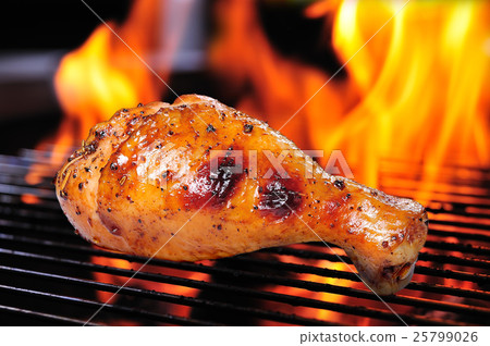 Grilled chicken leg on the flaming grill 25799026