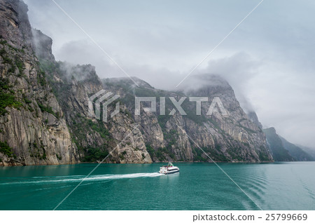 Norwegian Lysefjord view with small ferry. Norwegian Lysefjord view with small ferry. 25799669