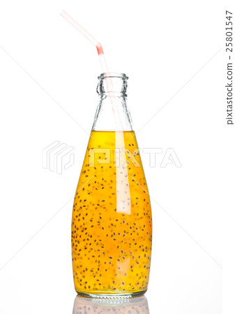 Bottle of exotic healthy juice with fruit seeds Bottle of exotic healthy juice with fruit seeds 25801547