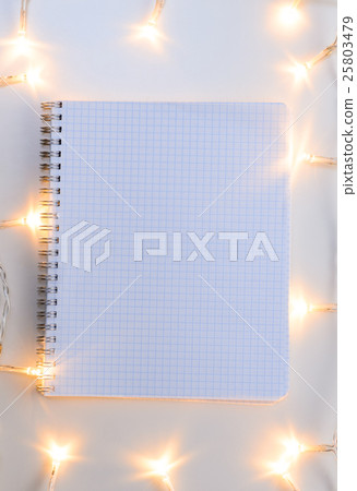 Christmas lights on gray table Christmas lights on gray table 25803479