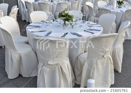Outdoor restaurant tables served for banquet Outdoor restaurant tables served for banquet 25805761