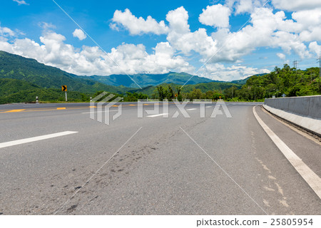Winding Paved Road with blue sky in the mountain. 25805954
