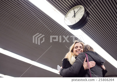 Senior couple standing at the underground platform 25808264