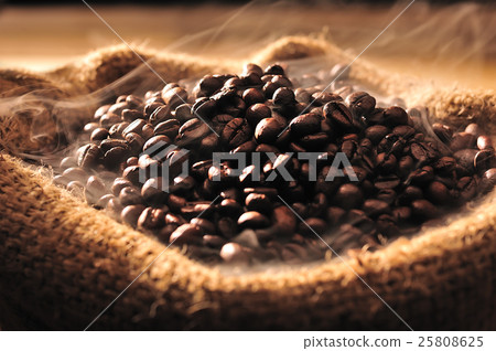 Coffee beans with smoke in burlap sack 25808625