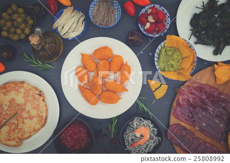 Table with spanish tapas 25808992