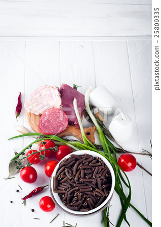 Dry Italian pasta spiraline, red cherry tomatoes,  25809335