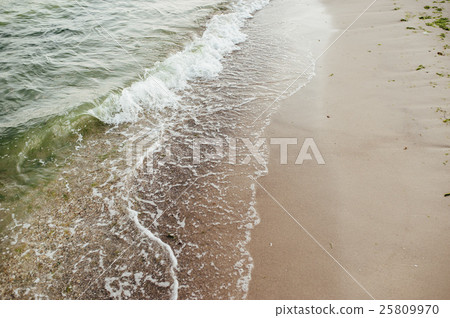 Soft wave of the sea on the sandy beach Soft wave of the sea on the sandy beach 25809970