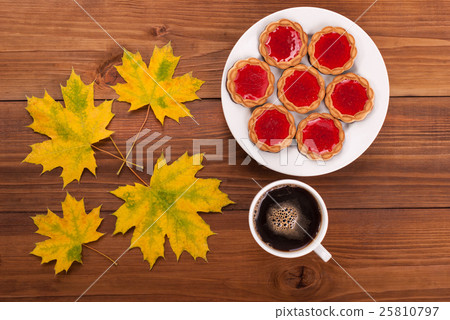Coffee and cookies autumn leaves. 25810797