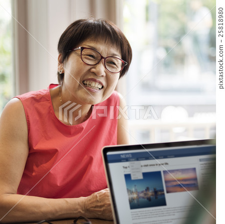 Senior Couple Using Laptop Concept Senior Couple Using Laptop Concept 25818980