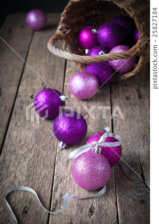 New Year's Balls Scattered on the Wooden Table 25827184