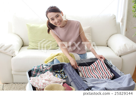 Girl preparing for travel Girl preparing for travel 25829144