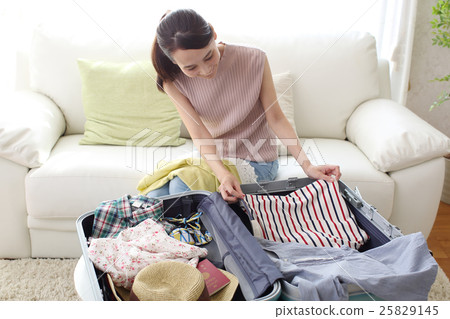 Girl preparing for travel Girl preparing for travel 25829145