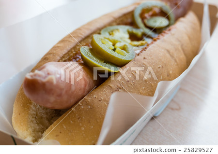 Hotdog with chili in white container Hotdog with chili in white container 25829527