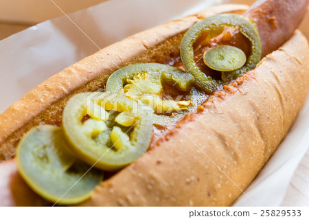 Hotdog with chili in white container Hotdog with chili in white container 25829533