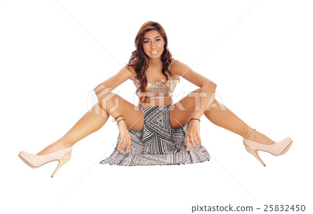 Beautiful woman sitting on floor. Beautiful woman sitting on floor. 25832450