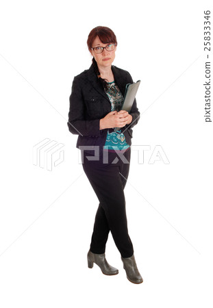 Businesswoman standing with clipboard. Businesswoman standing with clipboard. 25833346