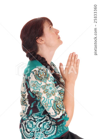 Pretty woman praying. Pretty woman praying. 25833360