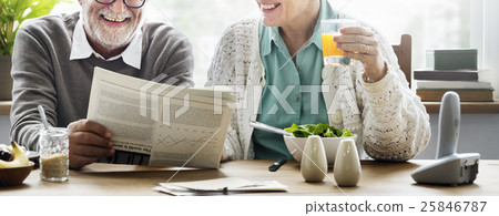 Senior Adult Reading Newspaper Concept 25846787