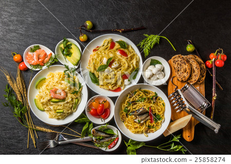 Italian food ingredients raw pasta Raw pasta and Italian ingredients 25858274
