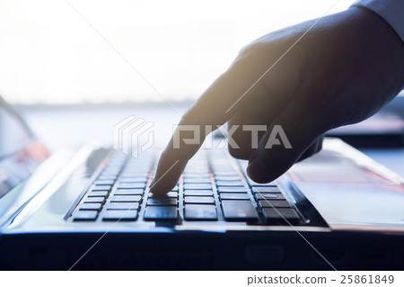 finger holding to phone on keyboard finger holding to phone on keyboard 25861849